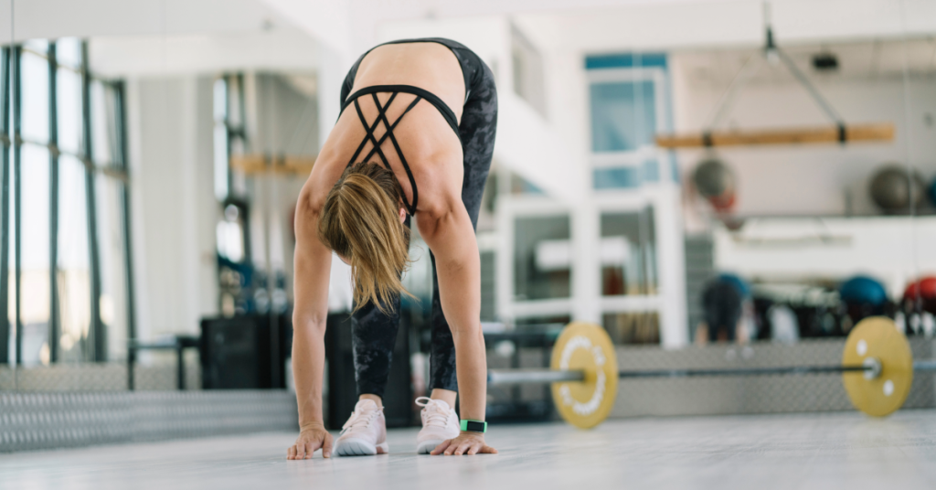Female Stretching in a fitness center